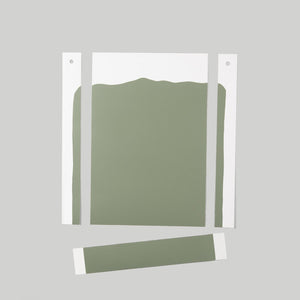 A photo of the 060 laying flat showing how the perforated edges work to give an edge to edge drawdown 